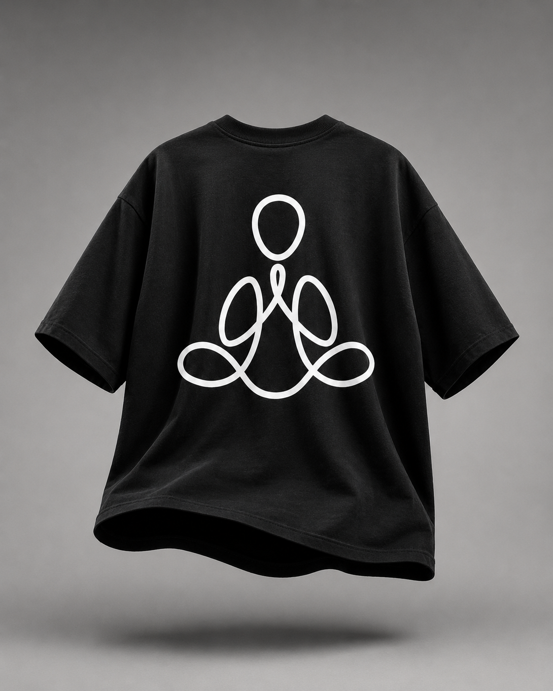 A black short-sleeve t-shirt with a white minimalist line-art graphic of a meditating figure on the front, shown floating against a neutral gray background.