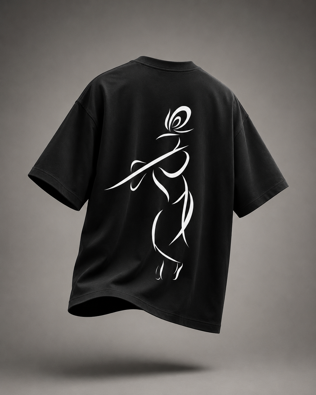 Back view of black oversized Krishna T-shirt featuring large minimalist Krishna line-art design