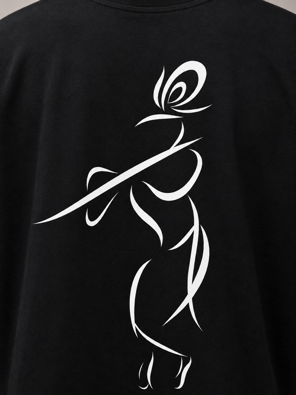 Close-up of Krishna line-art back print on premium black cotton T-shirt