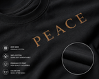 Close-up of a black cotton T-shirt with large metallic gold 'PEACE' lettering across the chest and a circular inset showing fabric texture. Text on the left lists material and print details.