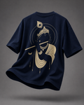 A navy blue short-sleeve t-shirt shown from the back, featuring a large gold graphic of Lord Krishna holding a flute. The t-shirt is presented in a floating, dynamic pose against a dark gray studio background.