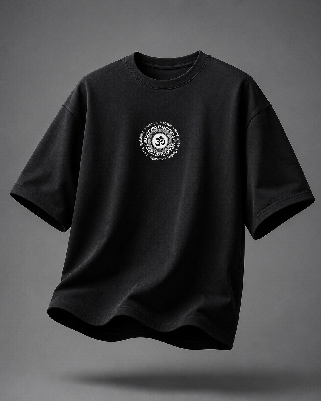 A black short-sleeve crewneck t-shirt with a circular white graphic printed on the center chest, shown floating against a dark gray gradient background.