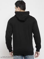 Person wearing a black hoodie from behind on a white background